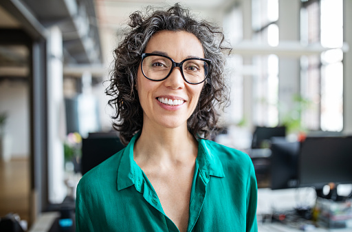 Woman smiling after learning about the benefits of all-on-4 dental implants from Ranches Family Dental in Eagle Mountain, UT